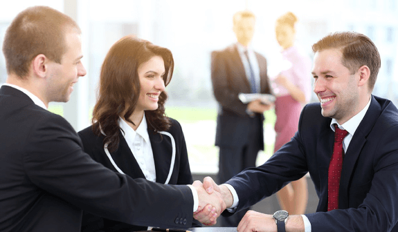 two business person shaking hands after successful deal
